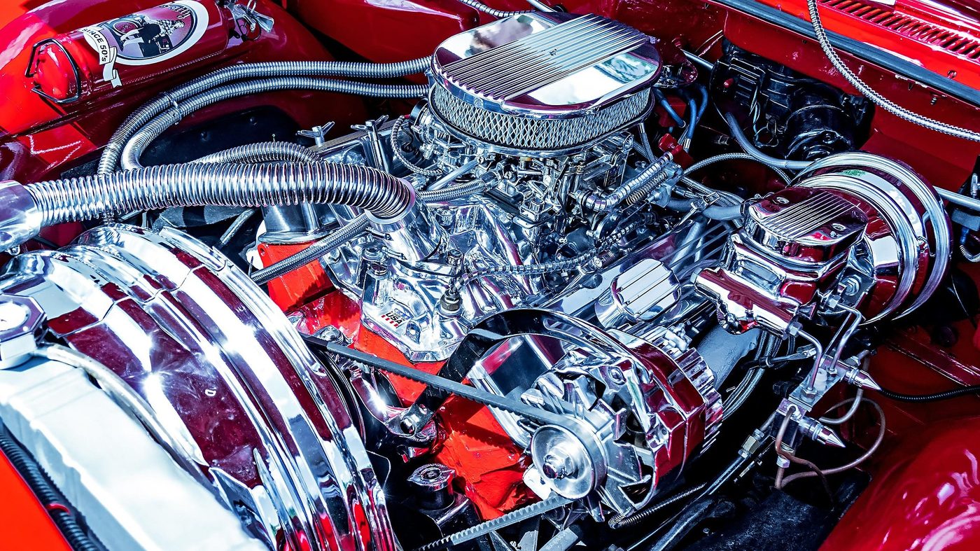 Close-up of a vehicle engine bay during technical inspection by Mema Auto Assessors